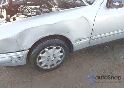 1999 Mercedes-Benz E 320 из США, поврежденный, VIN WDBJF65H3XA795472